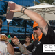 Guy Fieri dispenses BBQ sauce onto Foodgod's plate